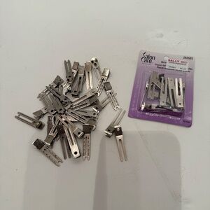 72 Used and 12 New Metal Roller Clips (84 Count)